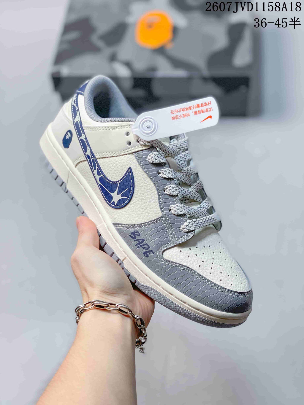 Nike SB Dunk Low Sneakers in Cream Gray Blue 2607JVD1158A18 - product image from the listing.