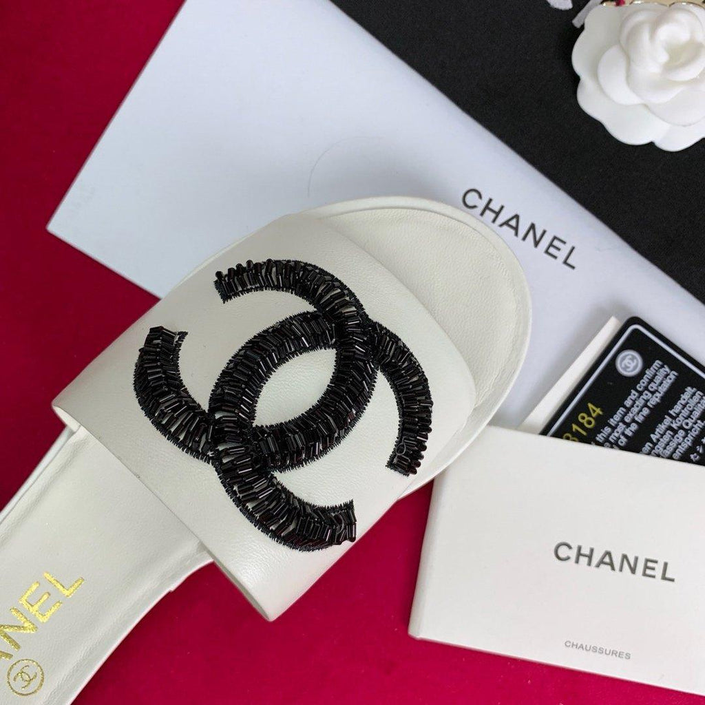 Sandals by Chanel - product photo shown in the listing for this item.