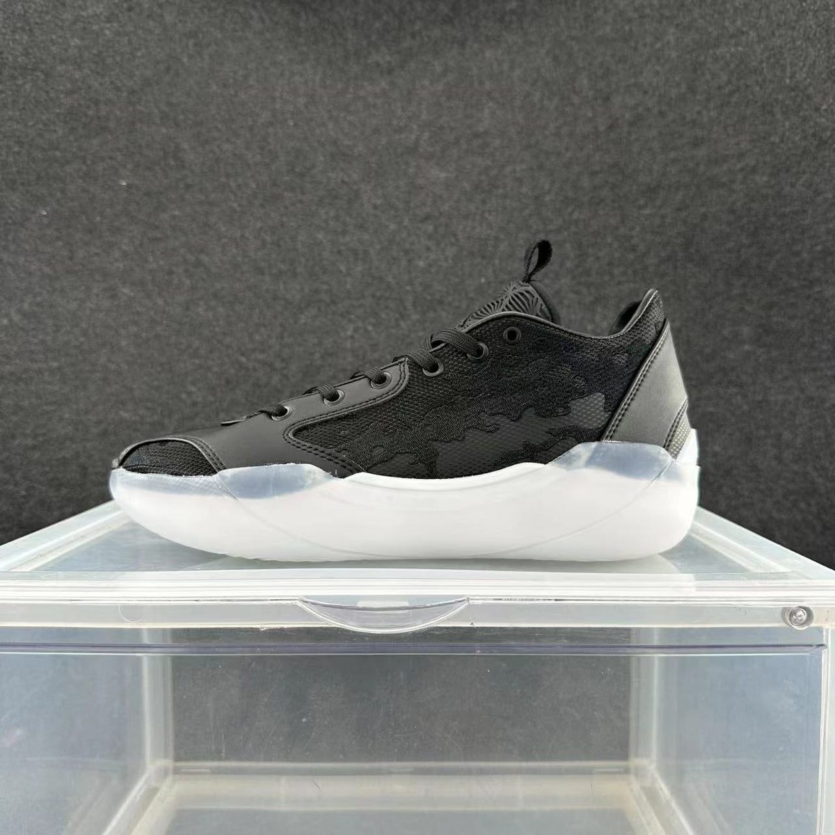 Jordan 39 Sneakers in Black and White - product image from the listing.