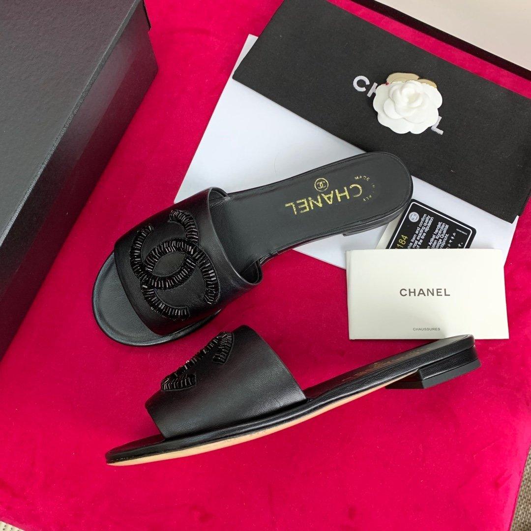Sandals by Chanel - product photo shown in the listing for this item.