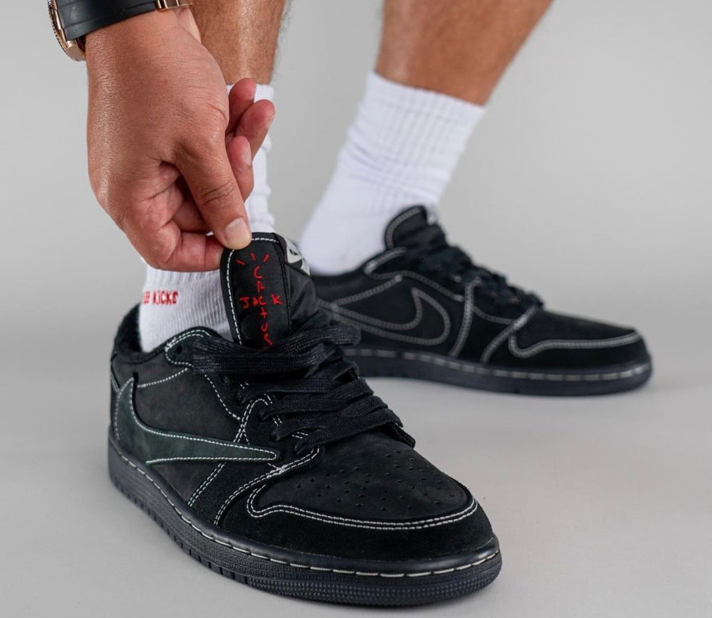 Jordan 1 Low OG Travis Scott Sneakers in Black DM7866-001 - product image from the listing.