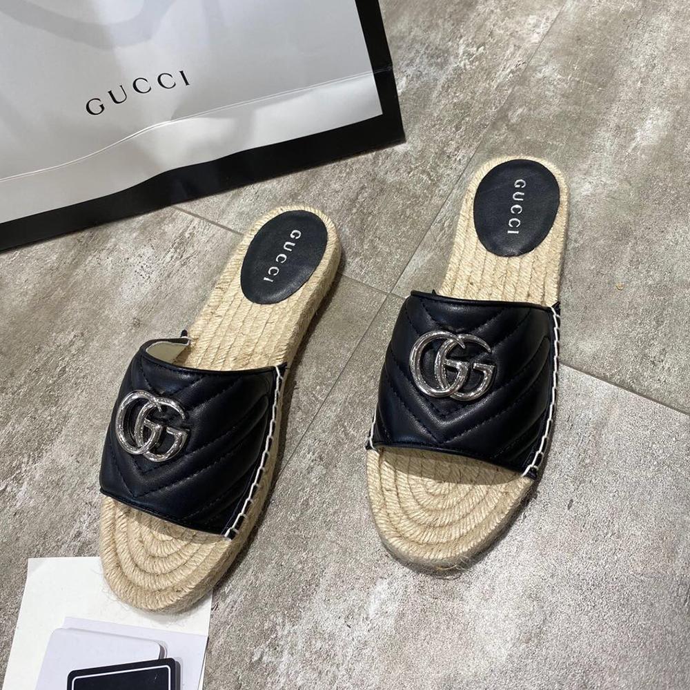 quilted leather slide sandals by Gucci - product image from the listing.