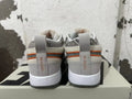Gray and Orange Nike Book 1 Sneakers - product image from the listing.