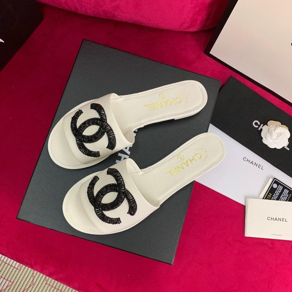 Sandals by Chanel - product photo shown in the listing for this item.