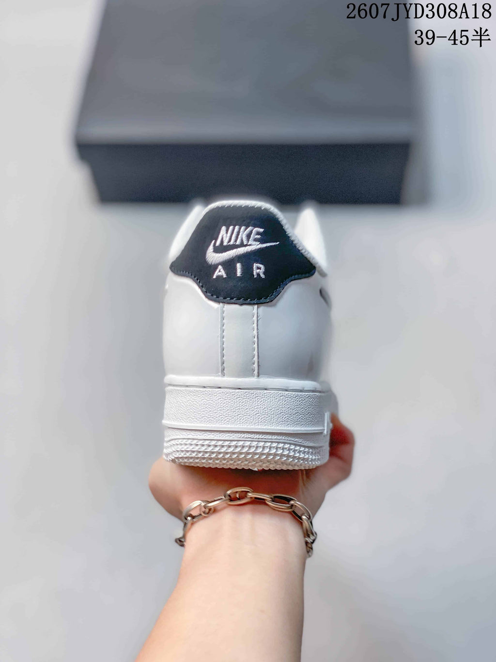 Nike Air Force 1 '07 Low Sneakers in White and Black - product image from the listing.