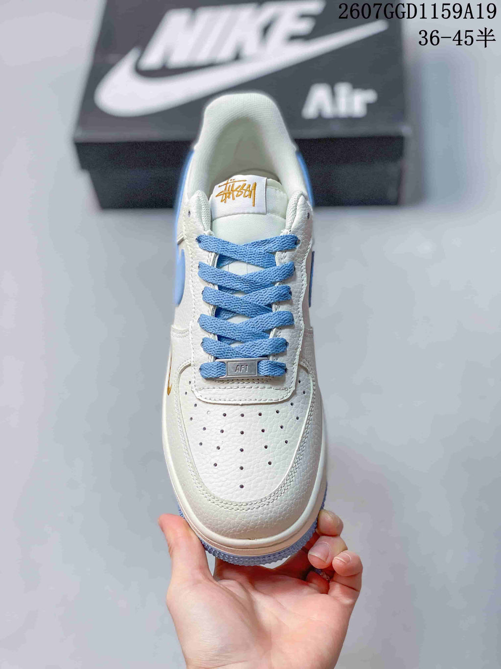 Nike Air Force 1 '07 Low Sneakers in White Light Blue - product image from the listing.