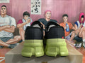 On Running Cloudmonster Sneakers in Black and Lime Green - product image from the listing.