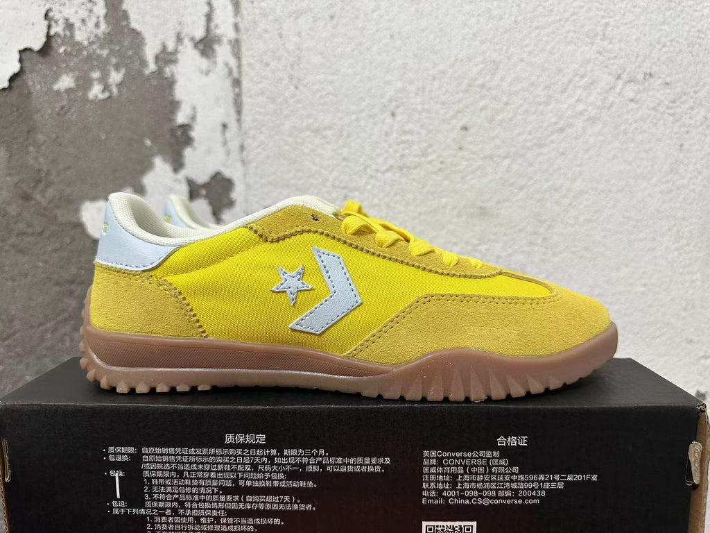 Yellow Converse Training Shoes - product image from the listing.