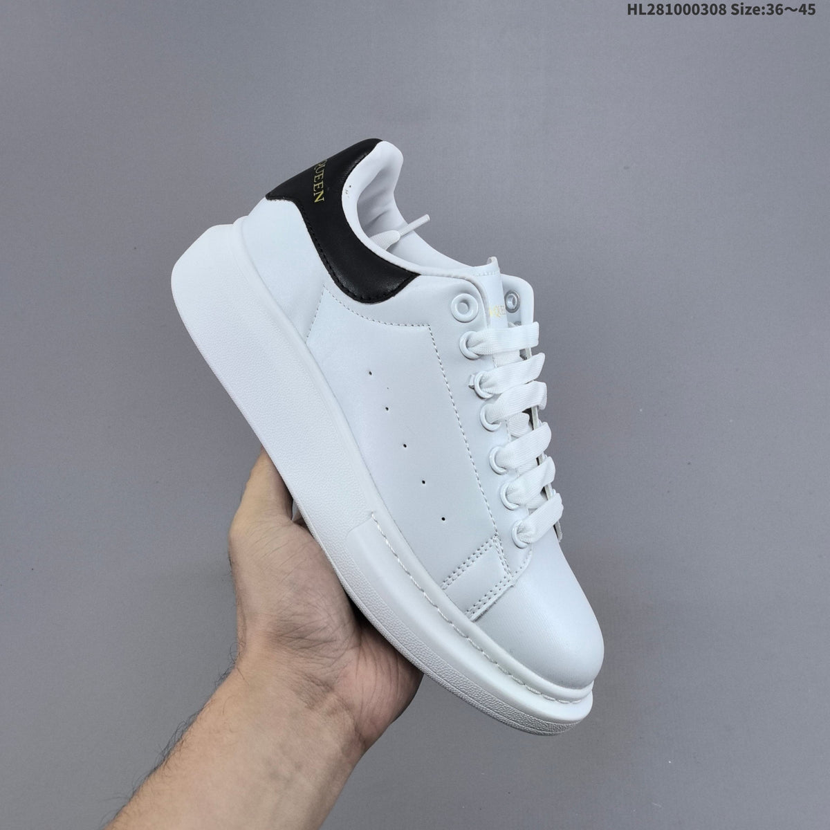 Alexander McQueen Oversized Low-Top Sneakers, in White and Black HL281000308 - product image from the listing.