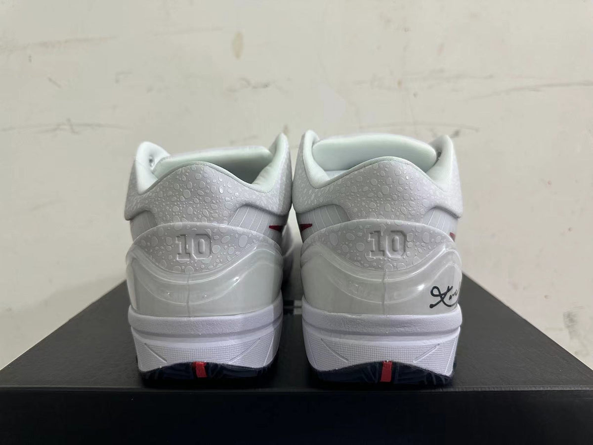 Nike Kobe 4 Protro Basketball Shoes in White - product image from the listing.