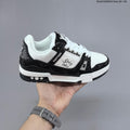 Louis Vuitton Low-Top Sneakers in Black or in Blue and White - product image from the listing.