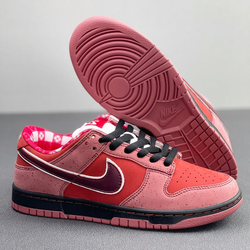 SB Dunk Low Concepts Red Lobster 313170-661 by Nike - product image from the listing.