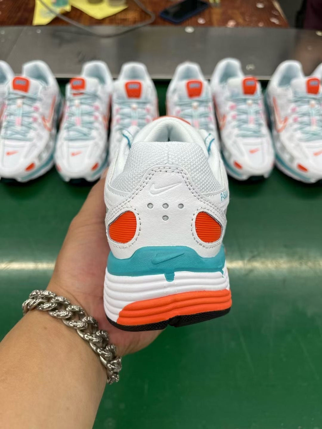 Nike P-6000 Sneakers in White Orange Teal - product image from the listing.