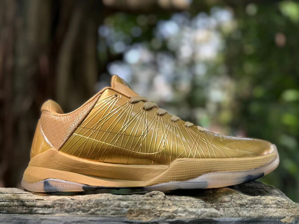 Metallic Gold Nike Kobe 5 Basketball Shoes - product image from the listing.