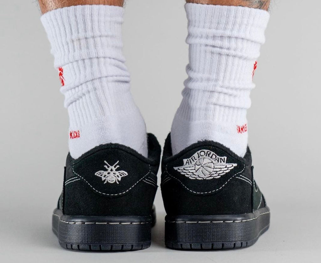 Jordan 1 Low OG Travis Scott Sneakers in Black DM7866-001 - product image from the listing.