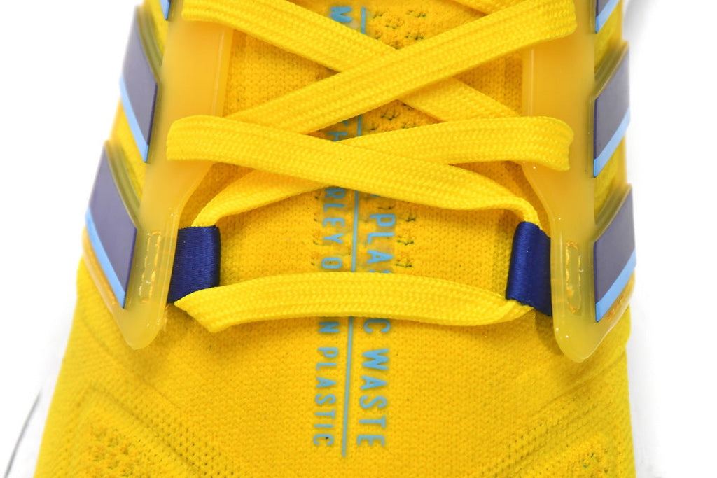 adidas UltraBoost 22 Shoes for Running, Yellow and Blue, GW1710 - product image from the listing.