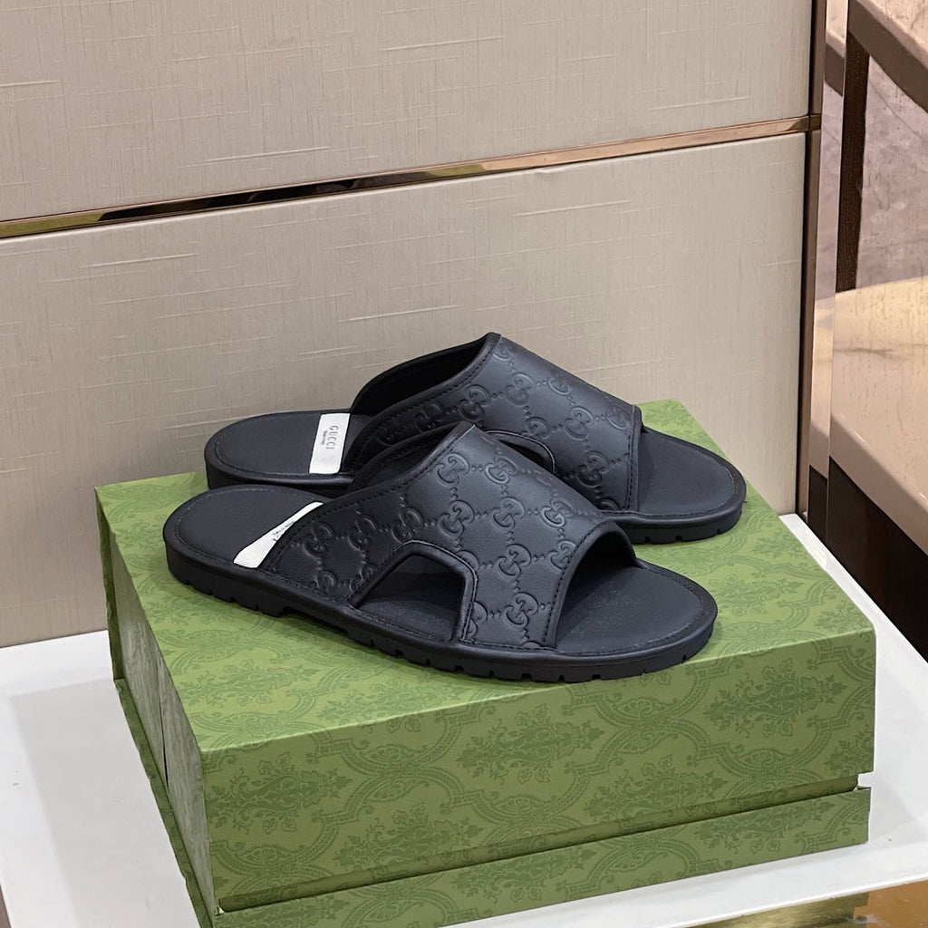 Men's Gucci Slides - product photo shown in the listing for this item.