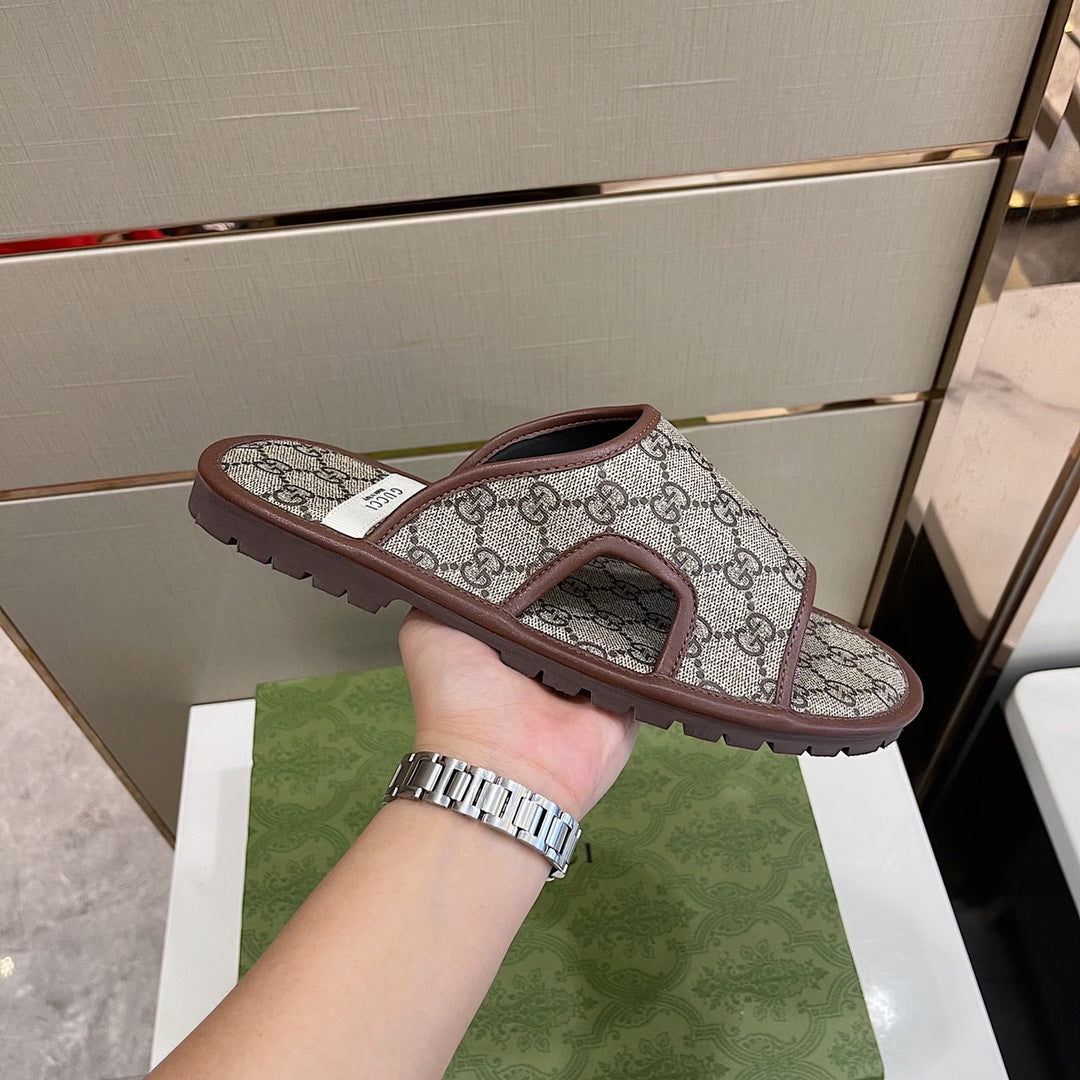 Men's Gucci Slides - product photo shown in the listing for this item.