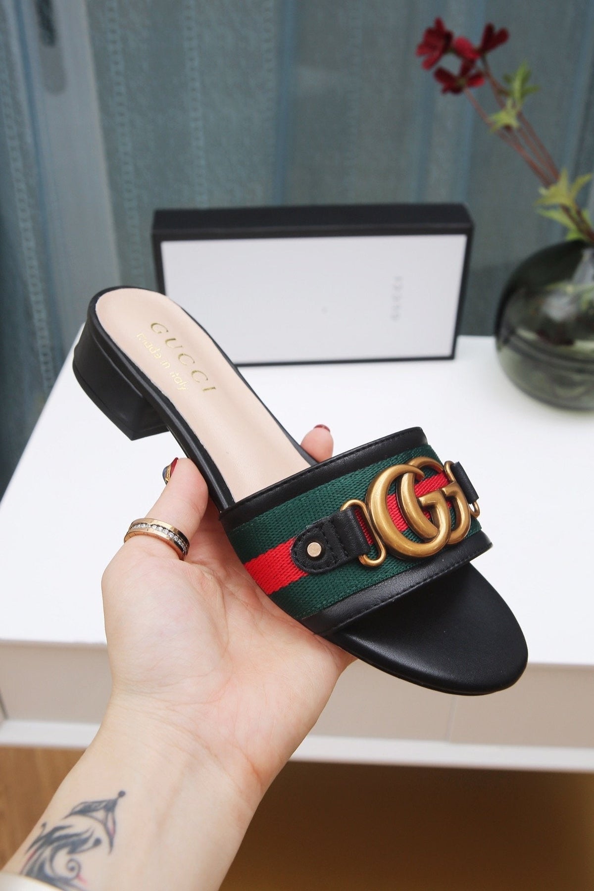 slides by Gucci - product photo shown in the listing for this item.