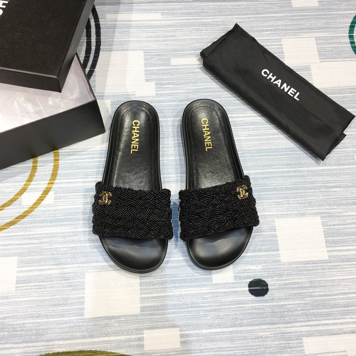 slides by Chanel - product photo shown in the listing for this item.
