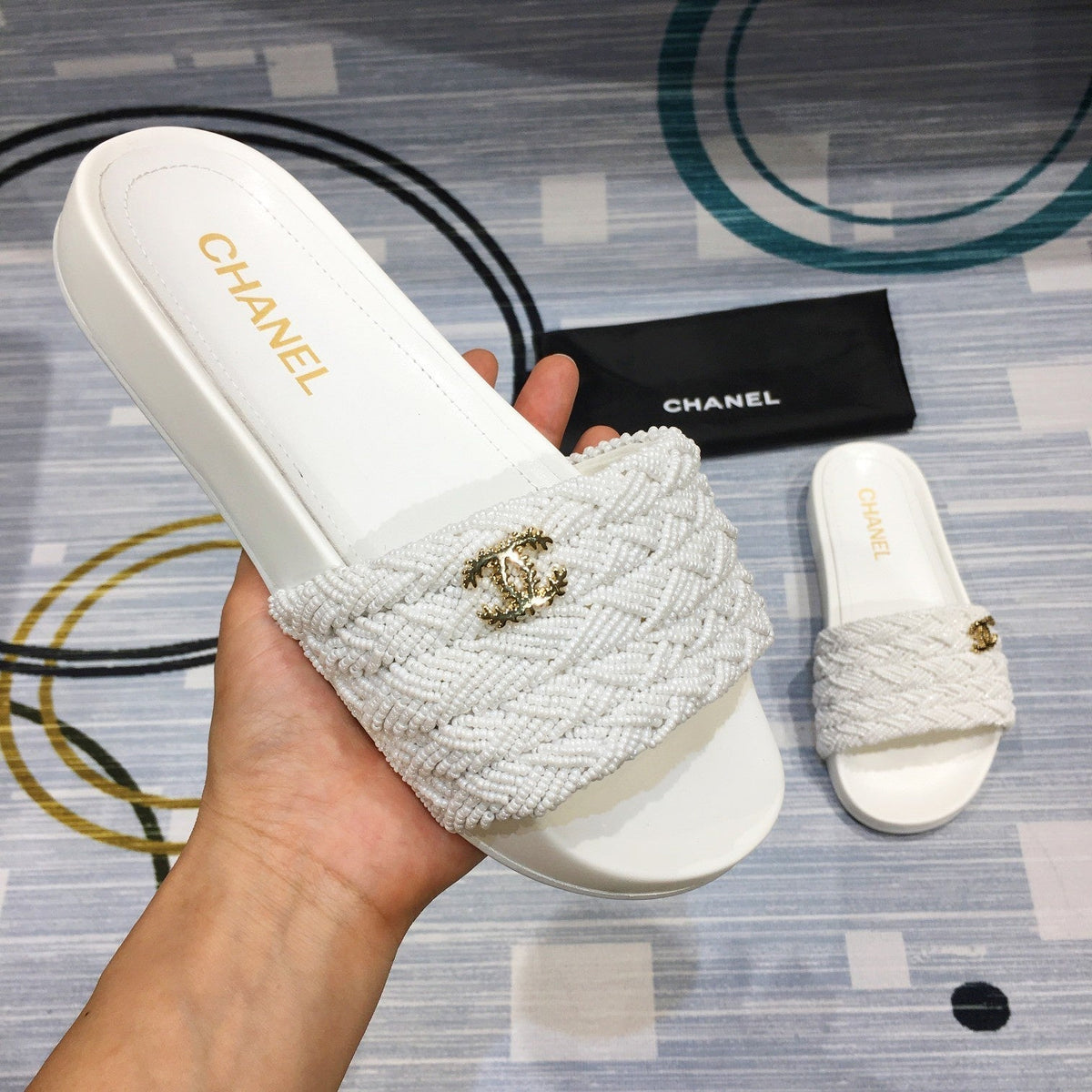 slides by Chanel - product photo shown in the listing for this item.