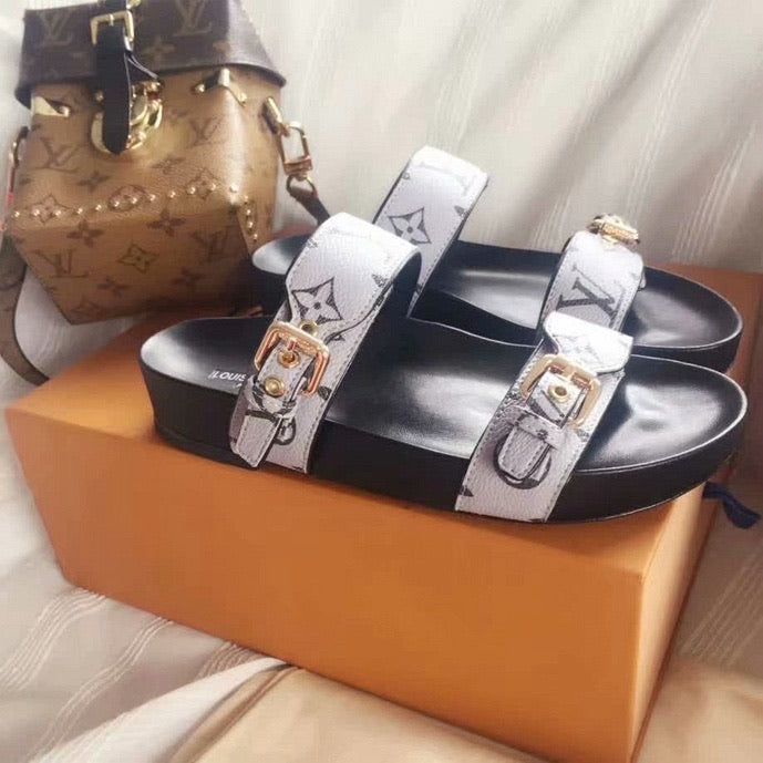 Lv sandals in gray - product photo shown in the listing for this item.