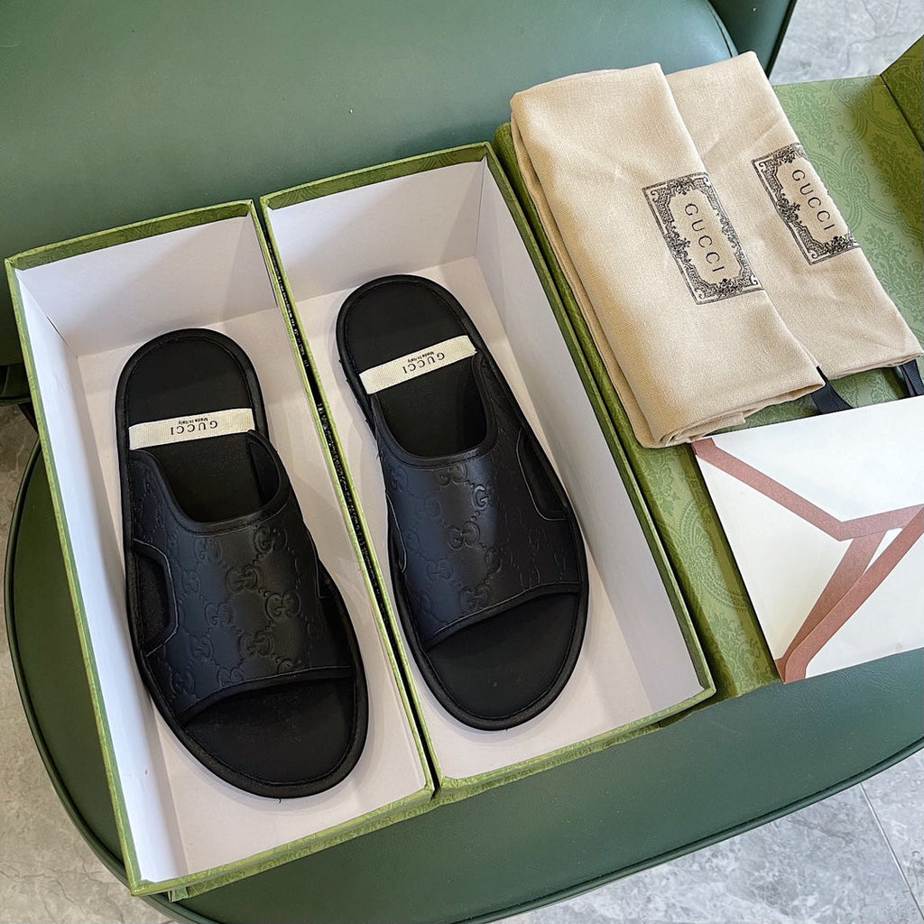 Men's Gucci Slides - product photo shown in the listing for this item.