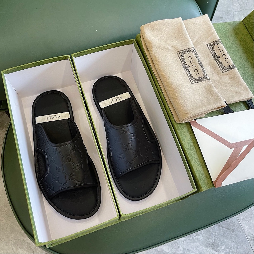 Men's Gucci Slides - product photo shown in the listing for this item.