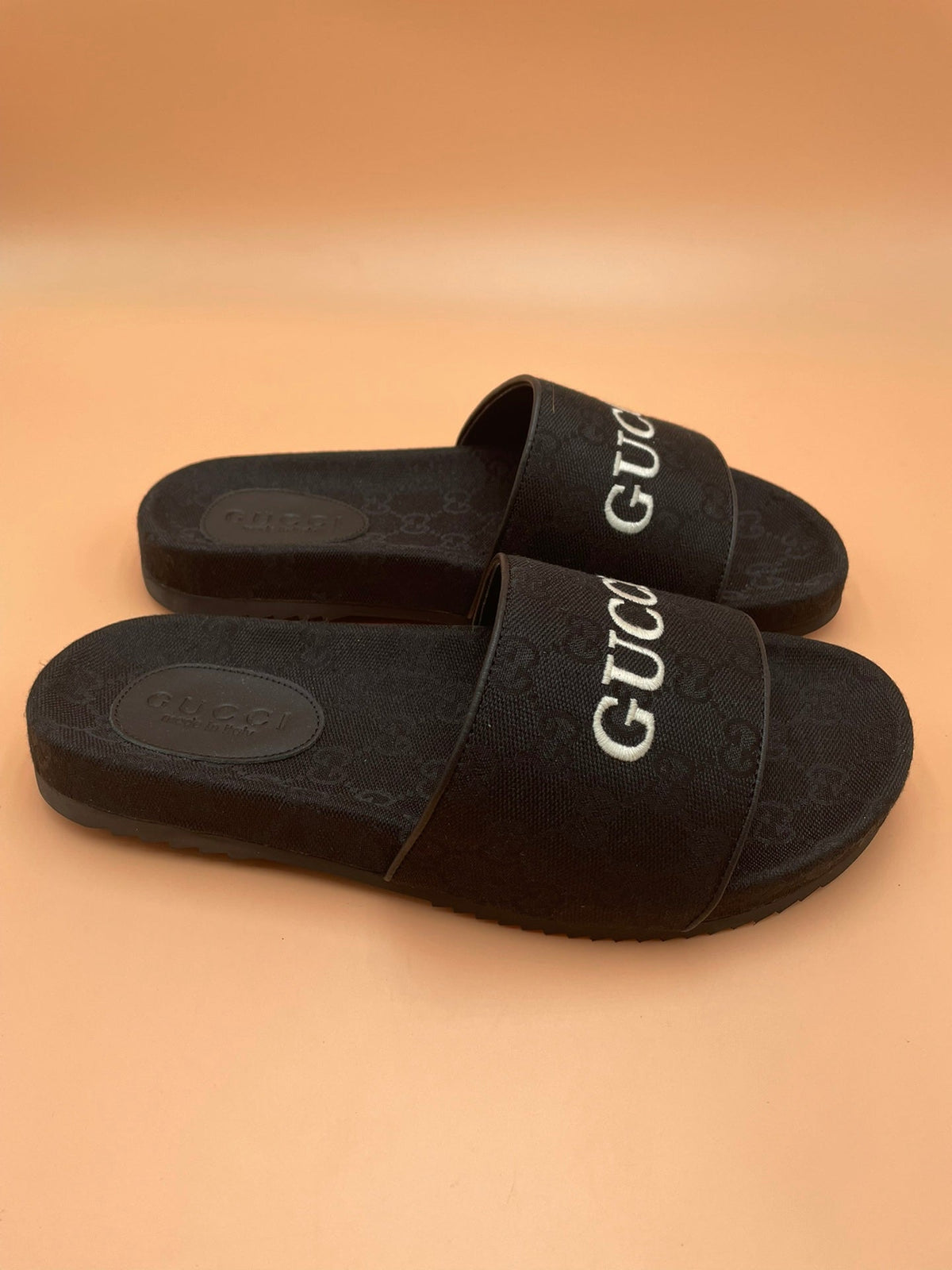 Men's Gucci Slides - product photo shown in the listing for this item.
