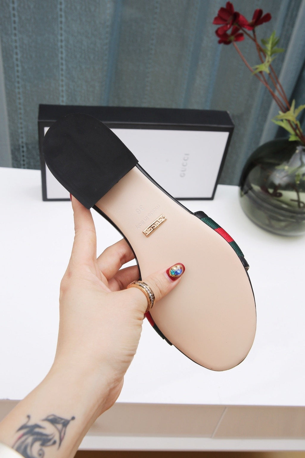 slides by Gucci - product photo shown in the listing for this item.