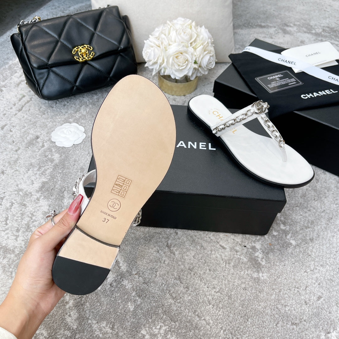 slides by Chanel - product photo shown in the listing for this item.