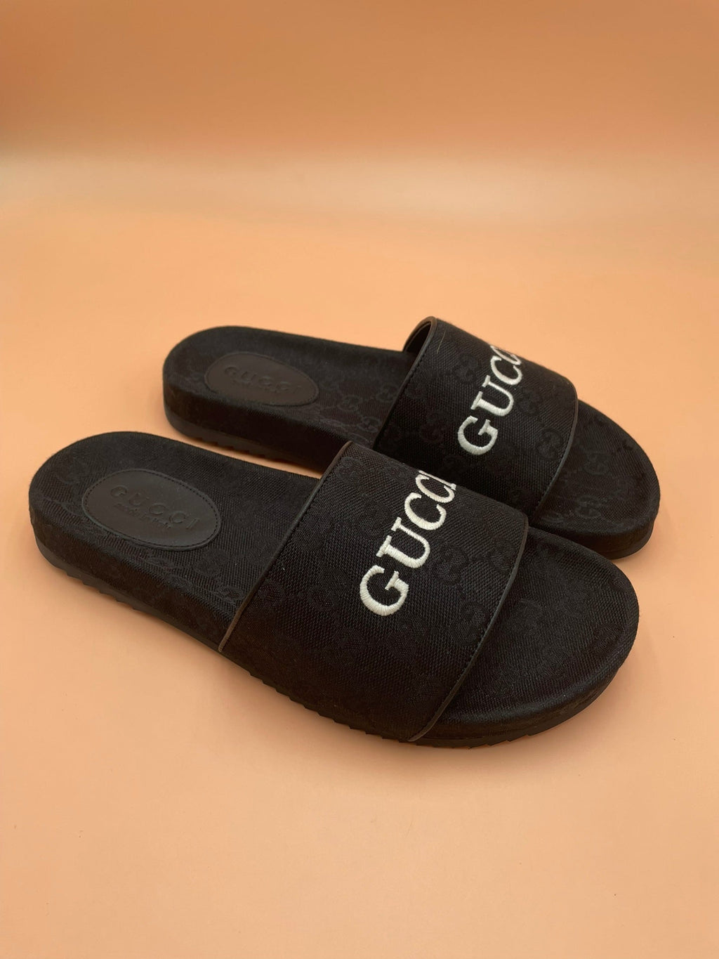 Men's Gucci Slides - product photo shown in the listing for this item.