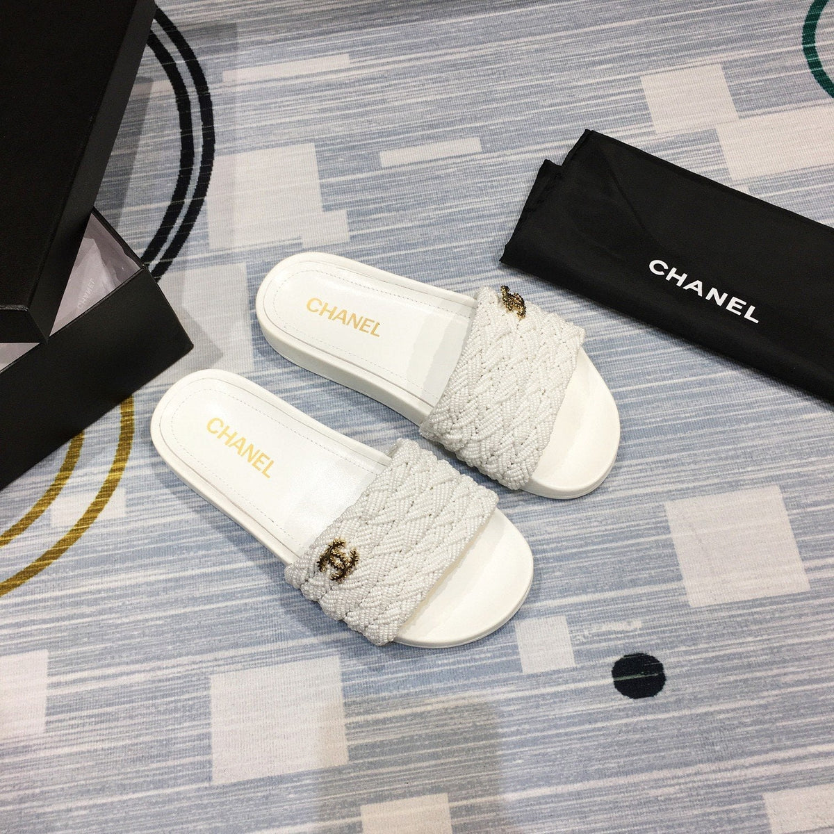 slides by Chanel - product photo shown in the listing for this item.