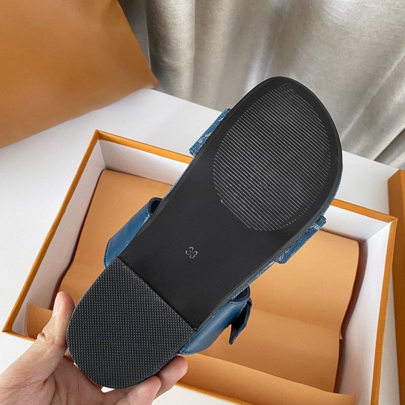Lv sandals in blue - product photo shown in the listing for this item.