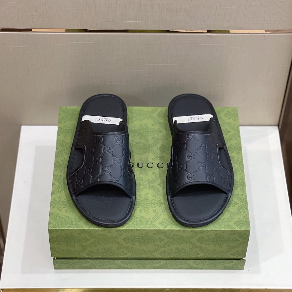Men's Gucci Slides - product photo shown in the listing for this item.