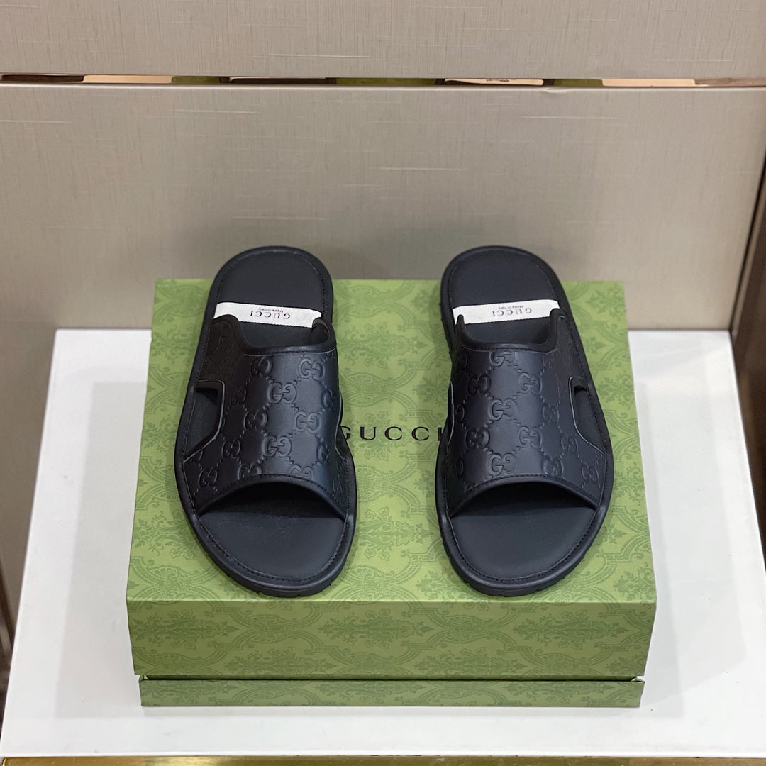 Men's Gucci Slides - product photo shown in the listing for this item.