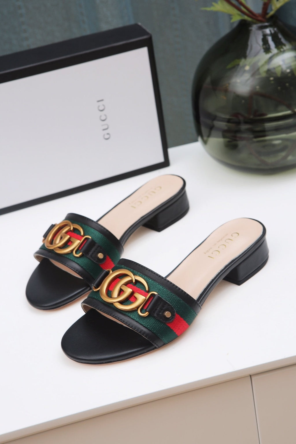 slides by Gucci - product photo shown in the listing for this item.