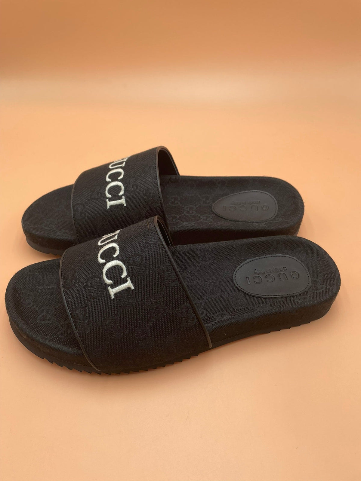 Men's Gucci Slides - product photo shown in the listing for this item.