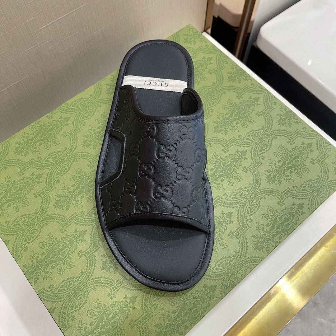 Men's Gucci Slides - product photo shown in the listing for this item.