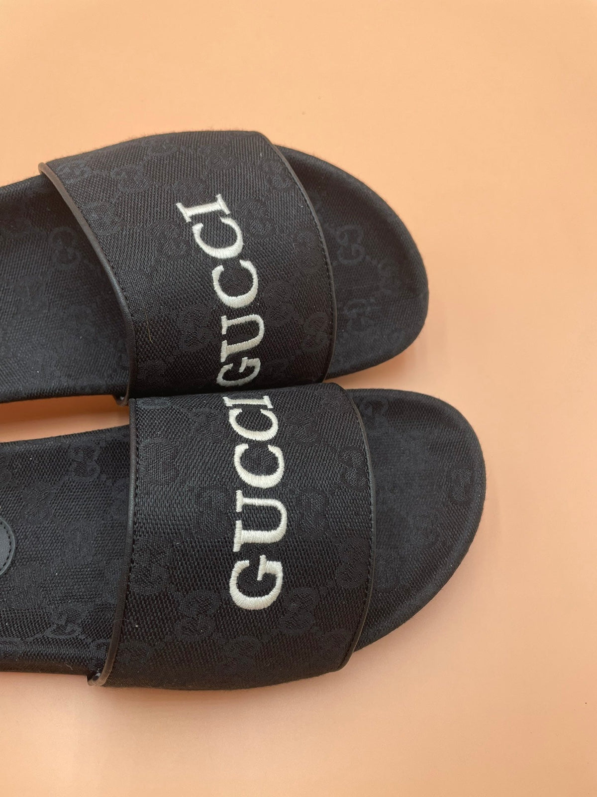 Men's Gucci Slides - product photo shown in the listing for this item.