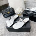 slides by Chanel - product photo shown in the listing for this item.