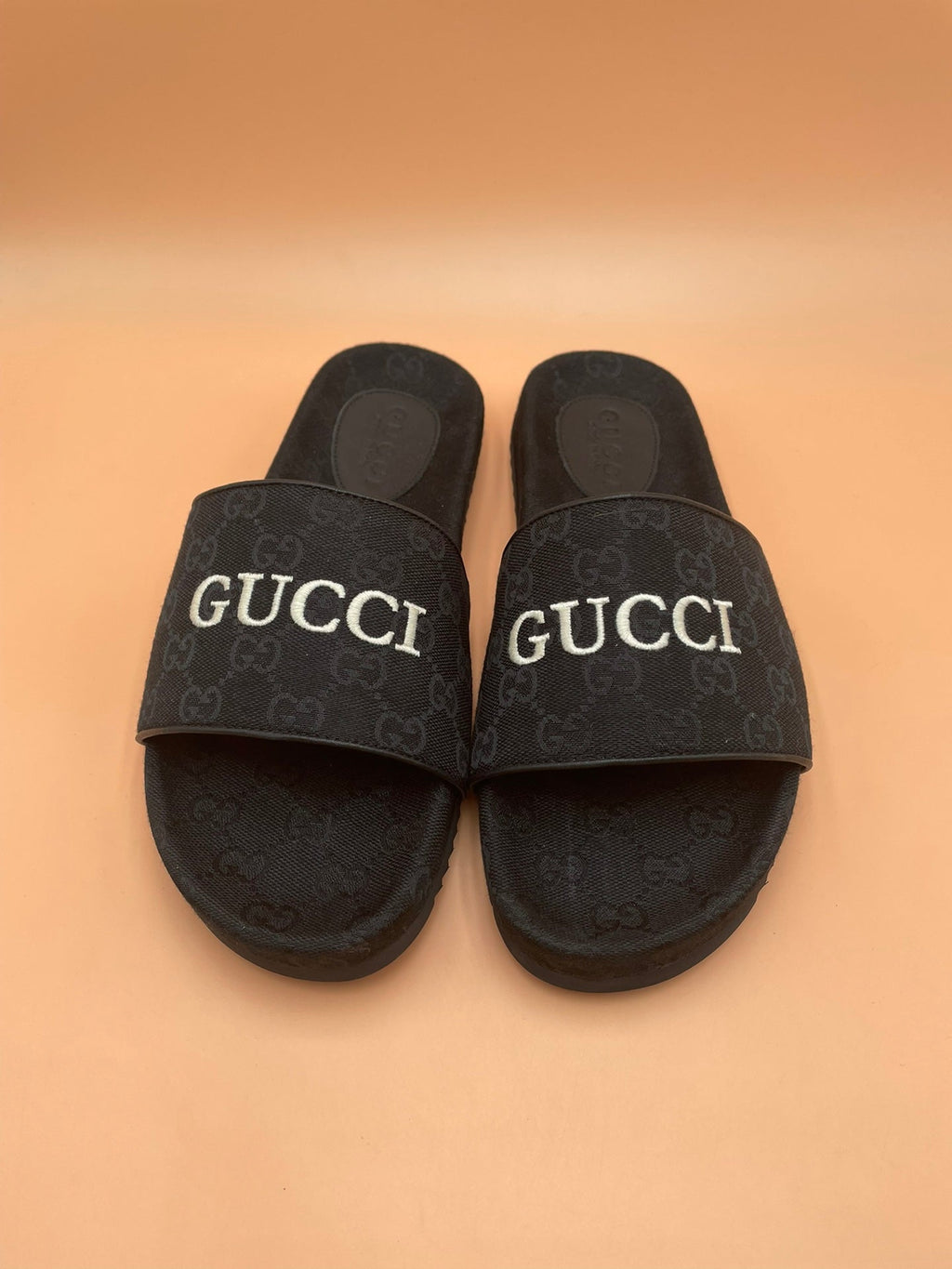 Men's Gucci Slides - product photo shown in the listing for this item.