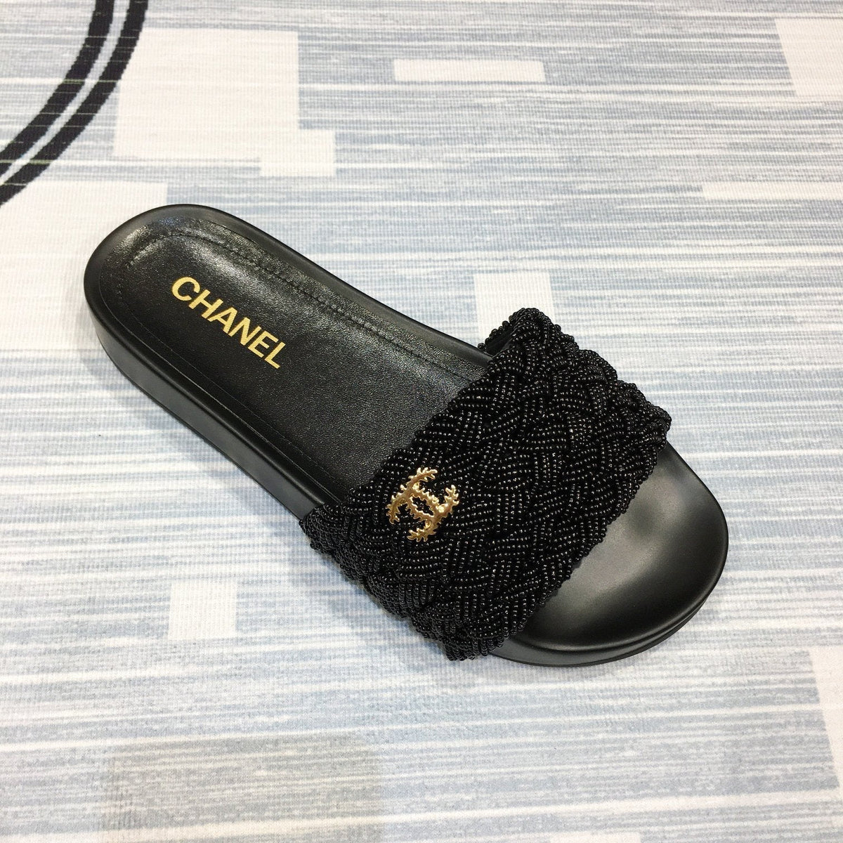 slides by Chanel - product photo shown in the listing for this item.