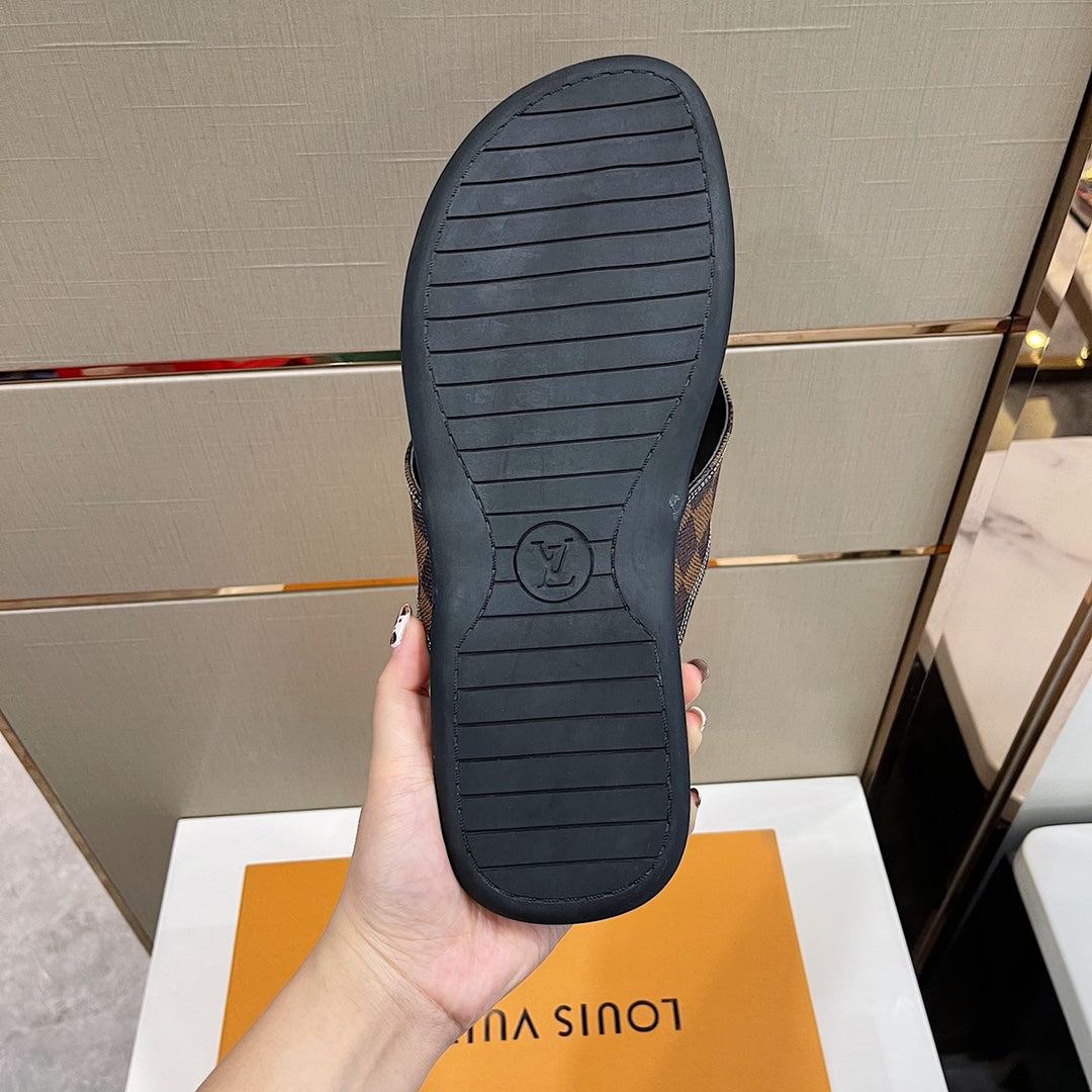 Men's Louis Vuitton Slippers - product image from the listing.
