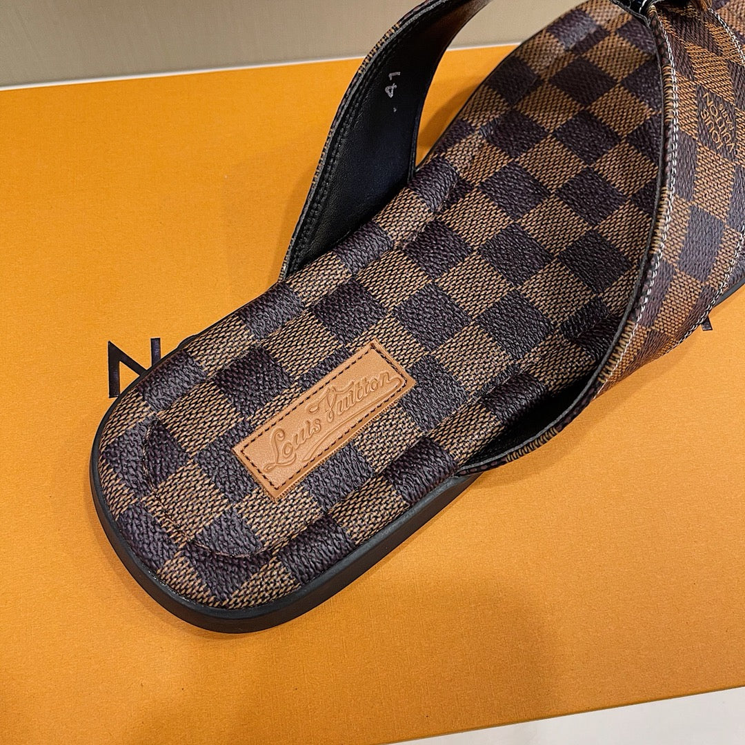 Men's Louis Vuitton Slippers - product image from the listing.
