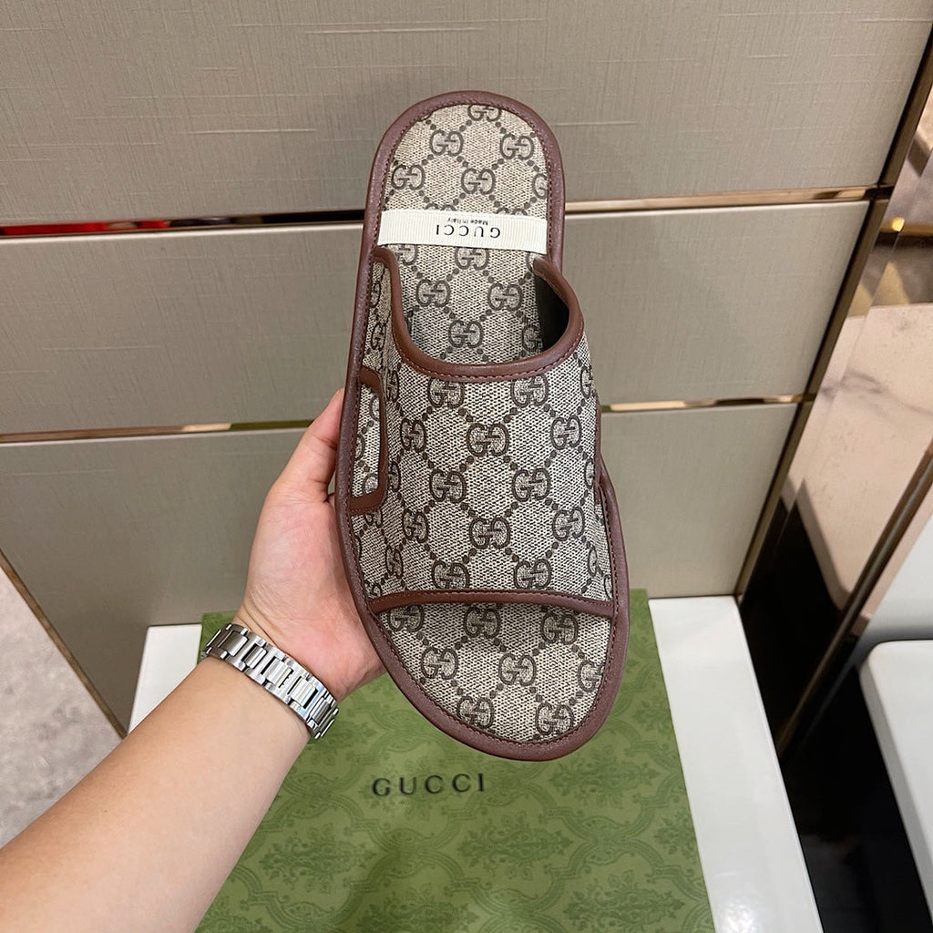 Men's Gucci Slides - product photo shown in the listing for this item.