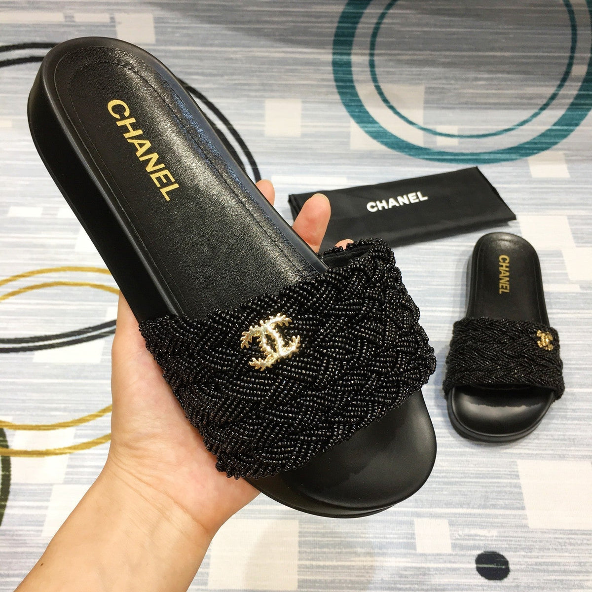 slides by Chanel - product photo shown in the listing for this item.