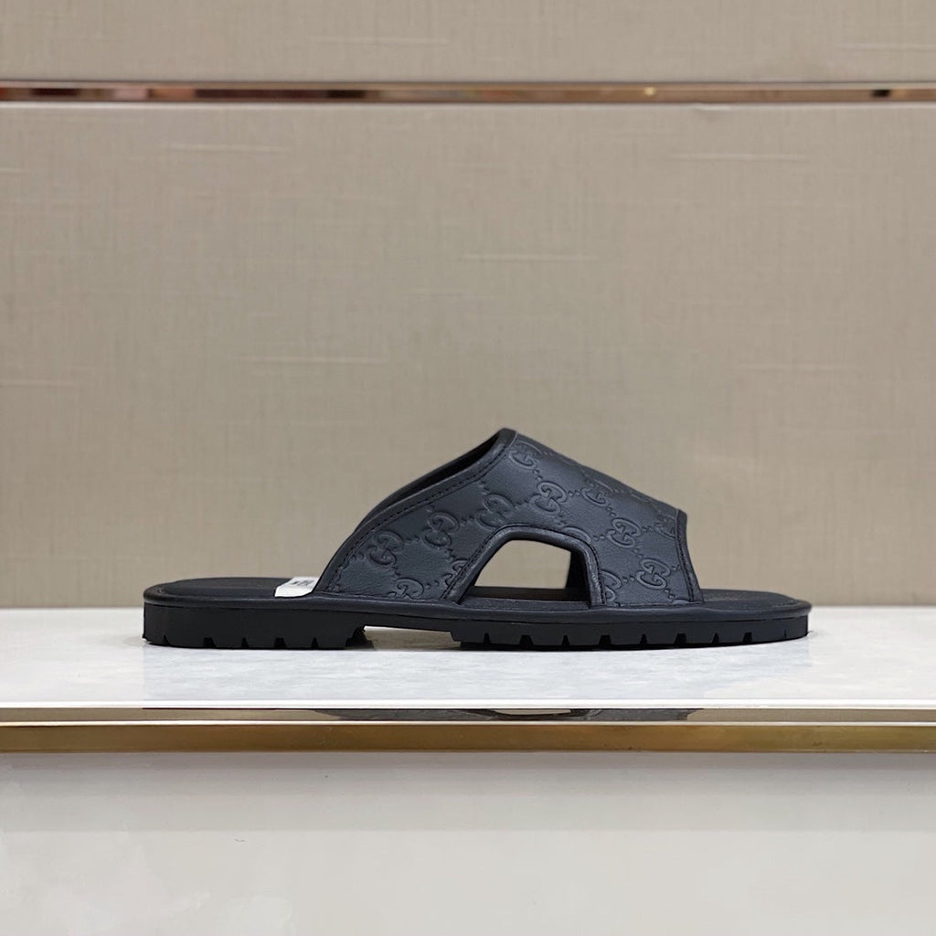Men's Gucci Slides - product photo shown in the listing for this item.