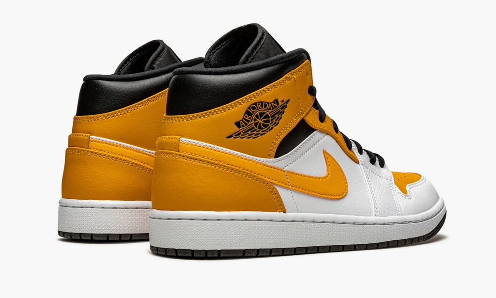 "University Gold" Jordan 1 Mid - product image from the listing.