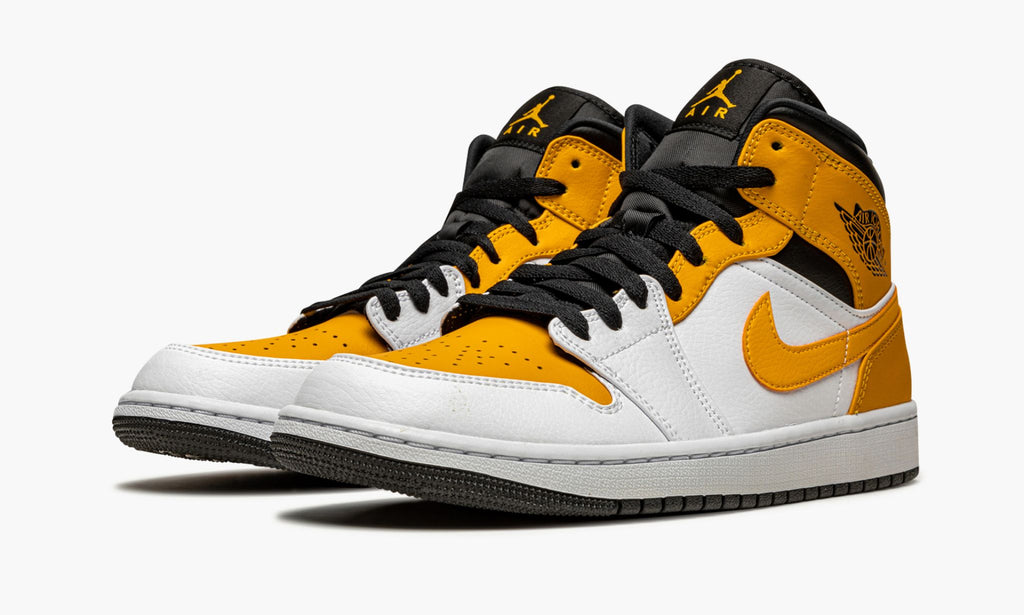 Jordan 1 Mid in University Gold - product image from the listing.